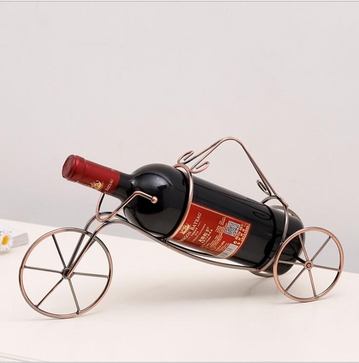 Creative metal wire art wine bottle holder with handle Rickshaw Design